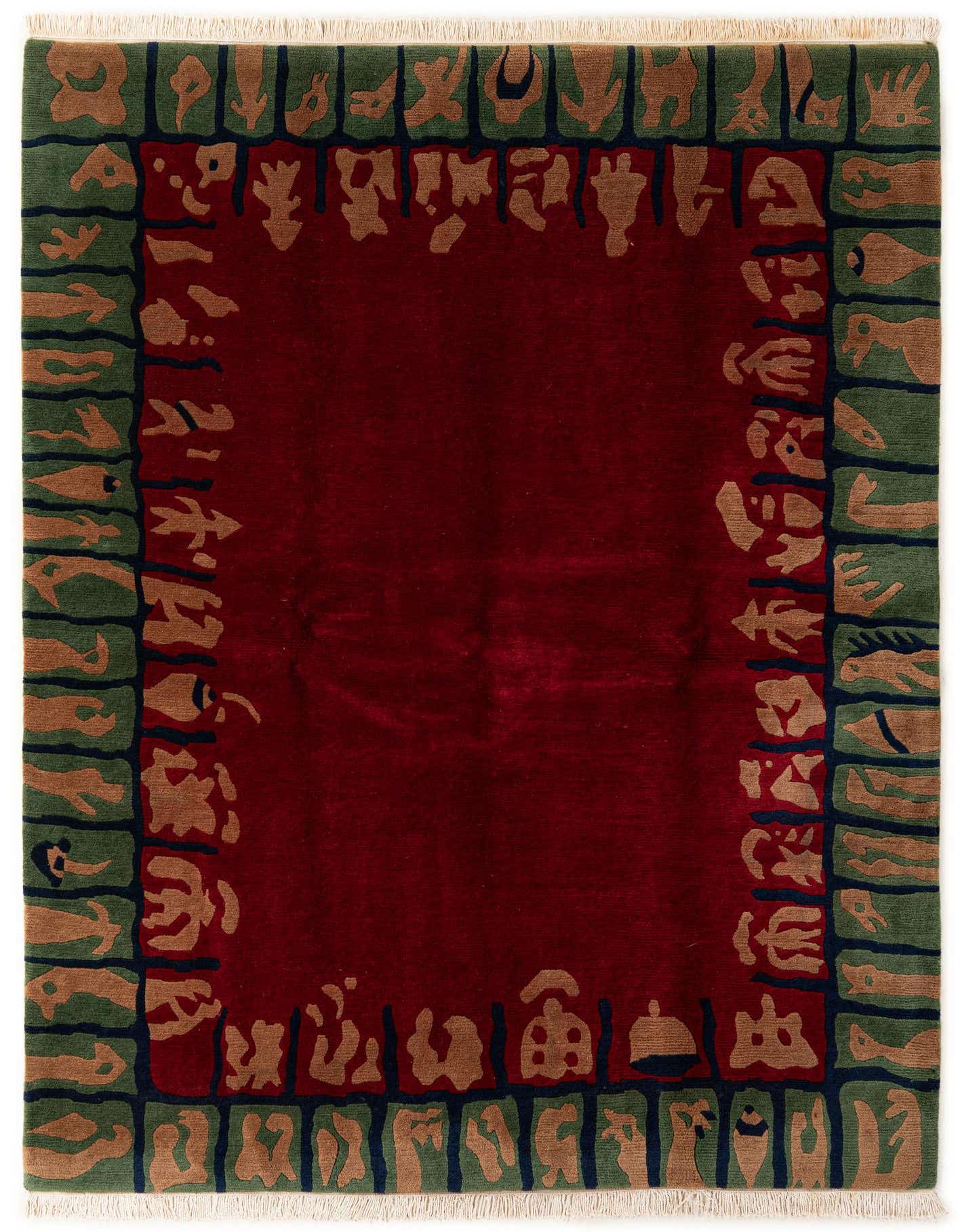 A 5x8 rectangular red wool rug with a modern abstract border in green, tan, and dark blue.