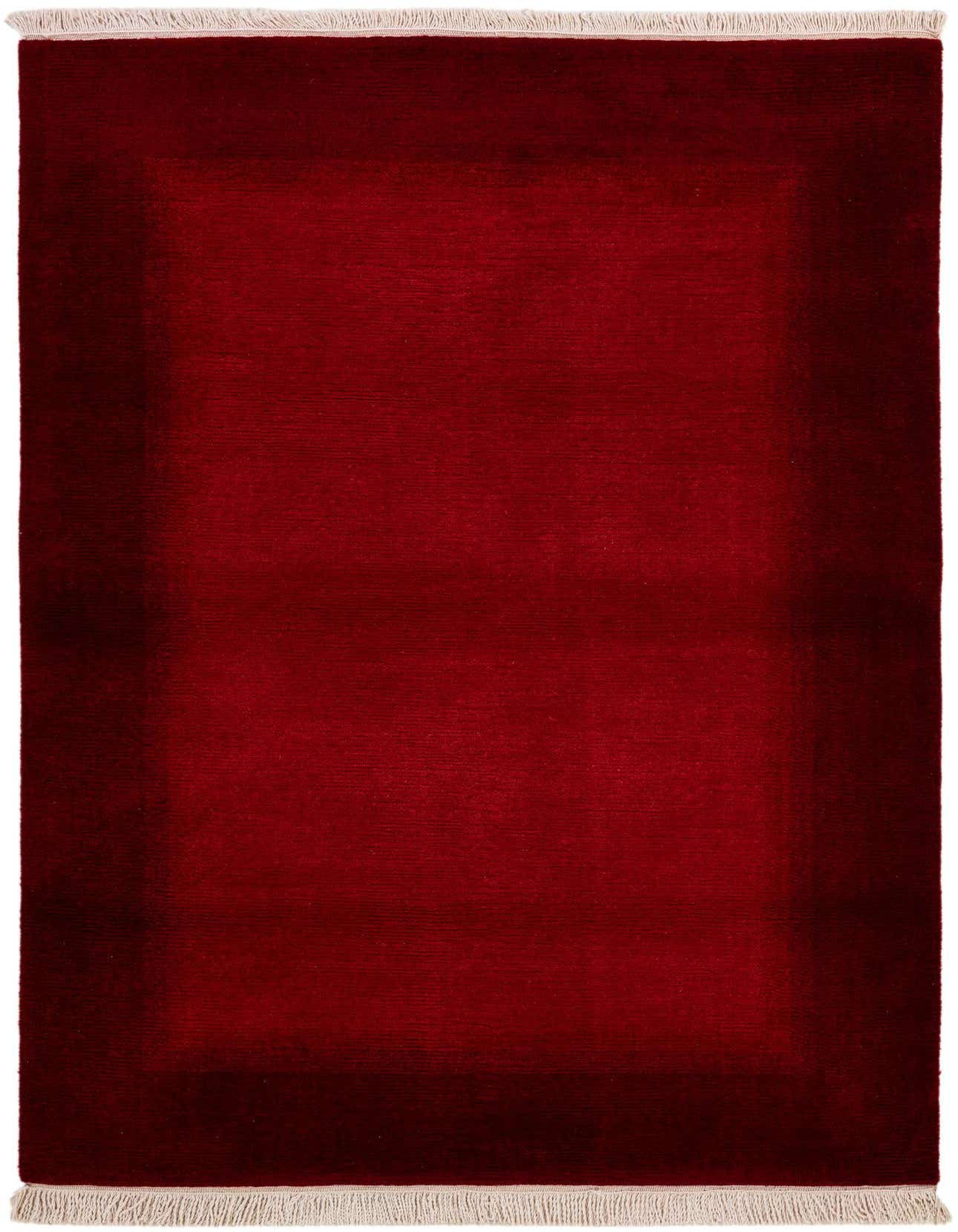 A 4x6 rectangular Rugs.com Tibet rug featuring a rich, solid red color with subtle tonal variations, and short white fringe on the ends.