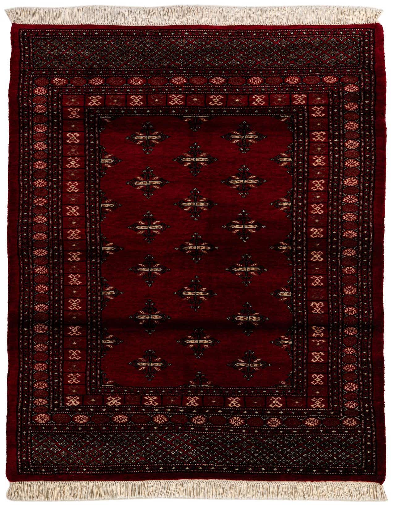 A 4x6 rectangular Torkaman rug in deep red with intricate traditional Persian patterns and cream fringe.