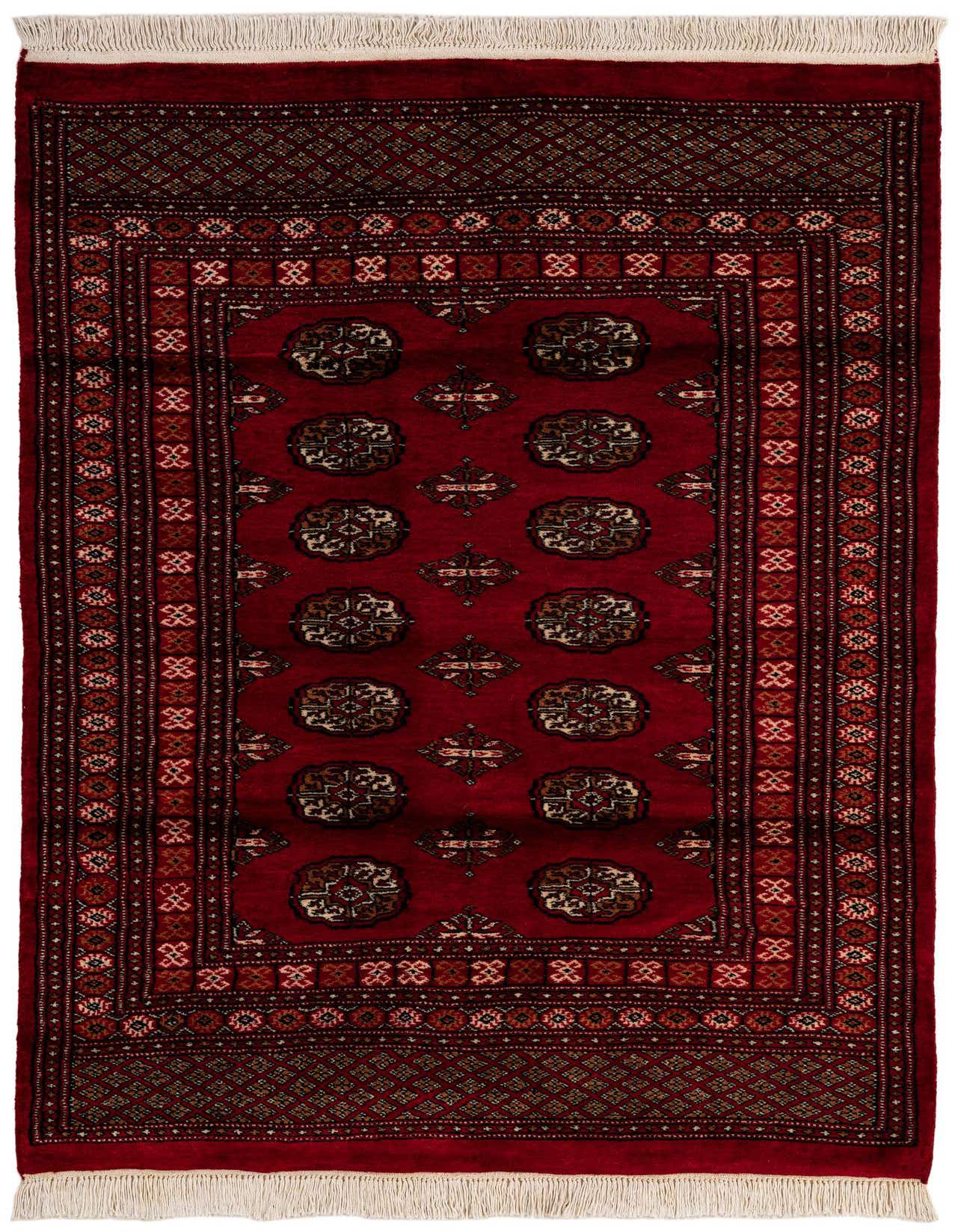 A 4x6 rectangular Torkaman rug in deep red with traditional Oriental patterns and white fringe.