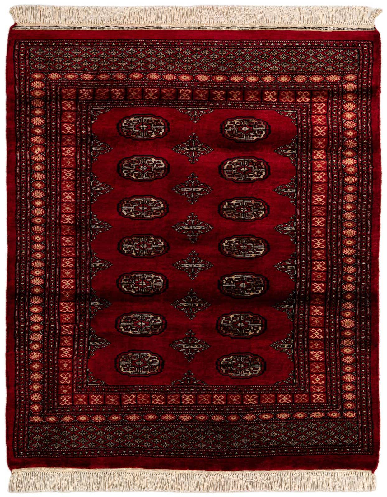 A 4x6 rectangular Torkaman rug in deep red with traditional Persian patterns and cream fringes.