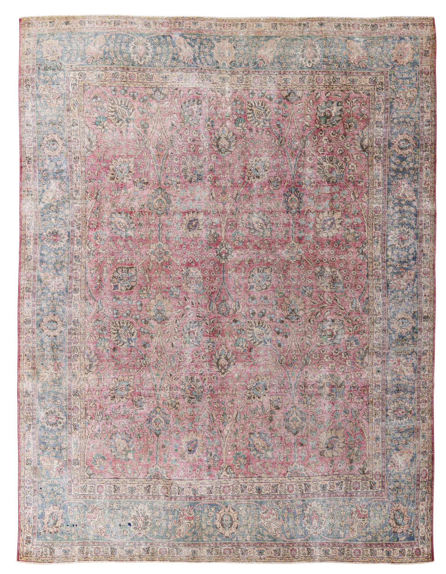 A 10x13 rectangular red Persian rug with a faded vintage look, featuring a central medallion and ornate floral patterns in blues and creams, ideal for a living room.