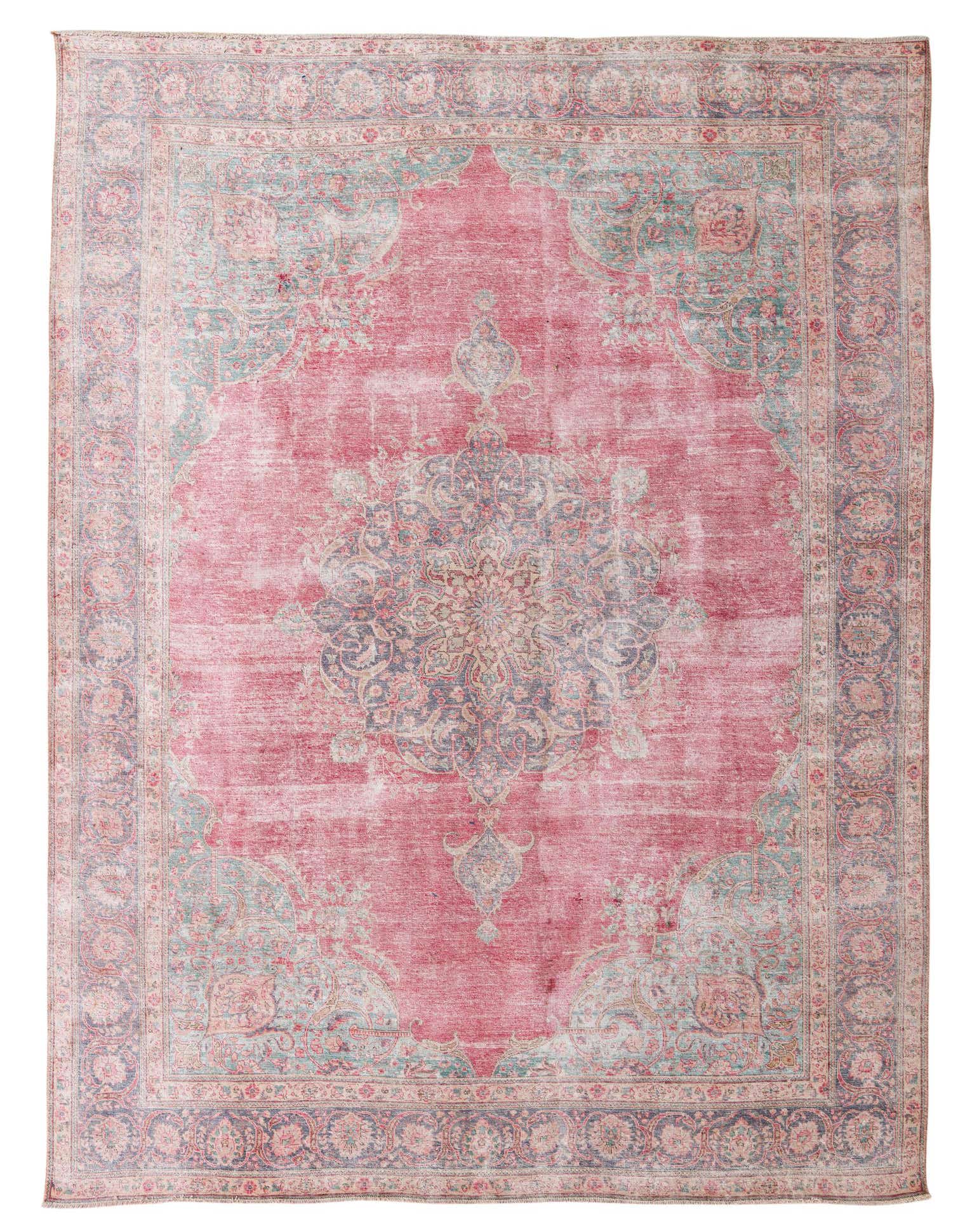 A 10x13 rectangular red Persian rug with a faded vintage medallion pattern and teal accents, suitable for a living room.