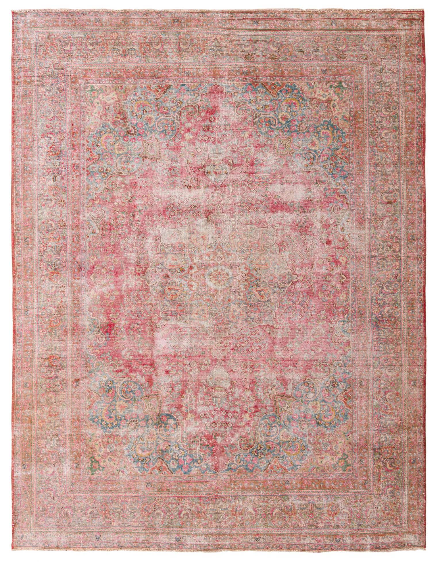 A large 10x13 rectangular red Persian area rug with a faded vintage medallion pattern and intricate border.