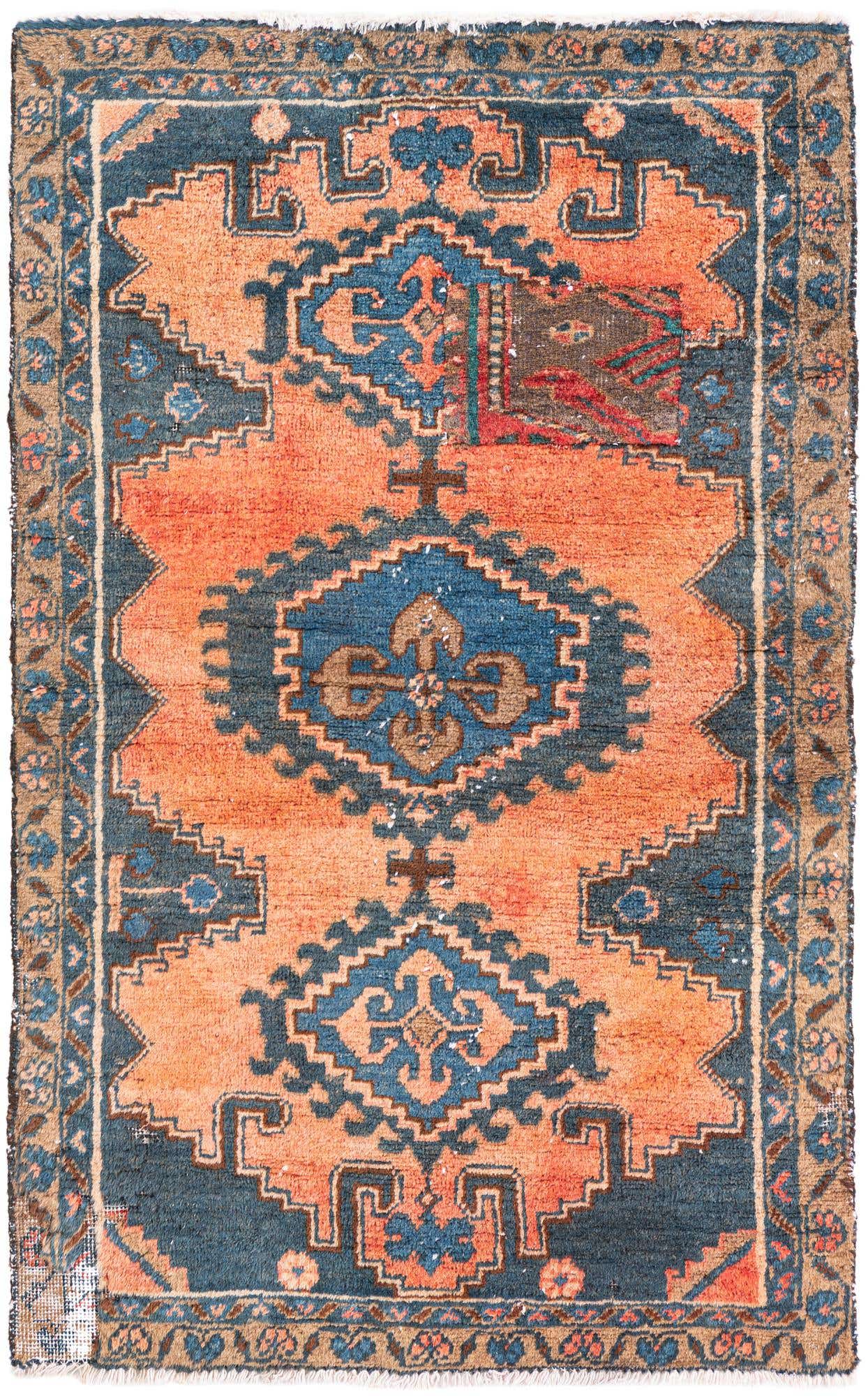 A 3x5 rectangular Ultra Vintage Persian rug with a red field and a central medallion in blue and brown, surrounded by intricate geometric patterns and a detailed border.