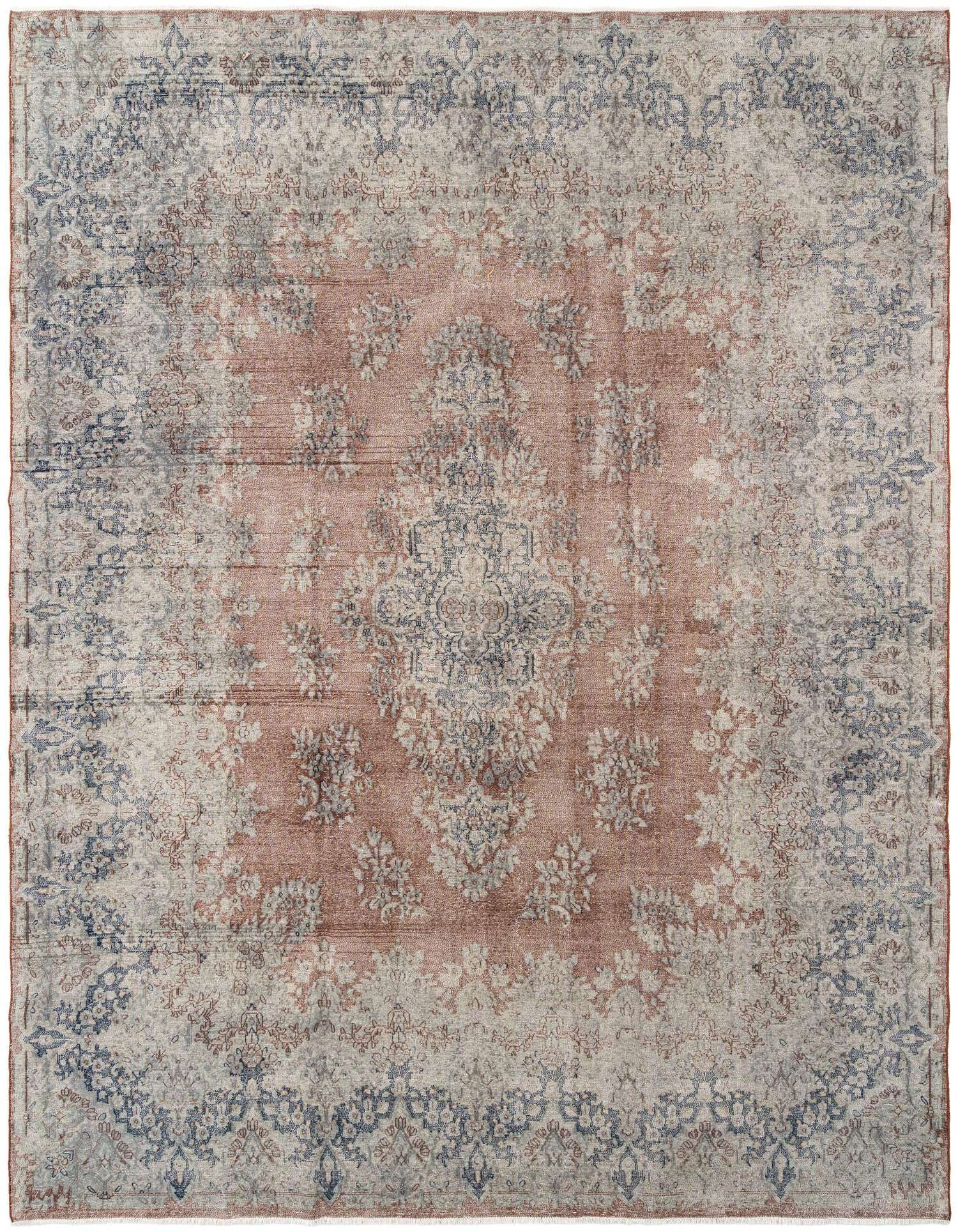 A large 10x13 rectangular Vintage Royal rug with a faded red center and intricate blue and white floral patterns.