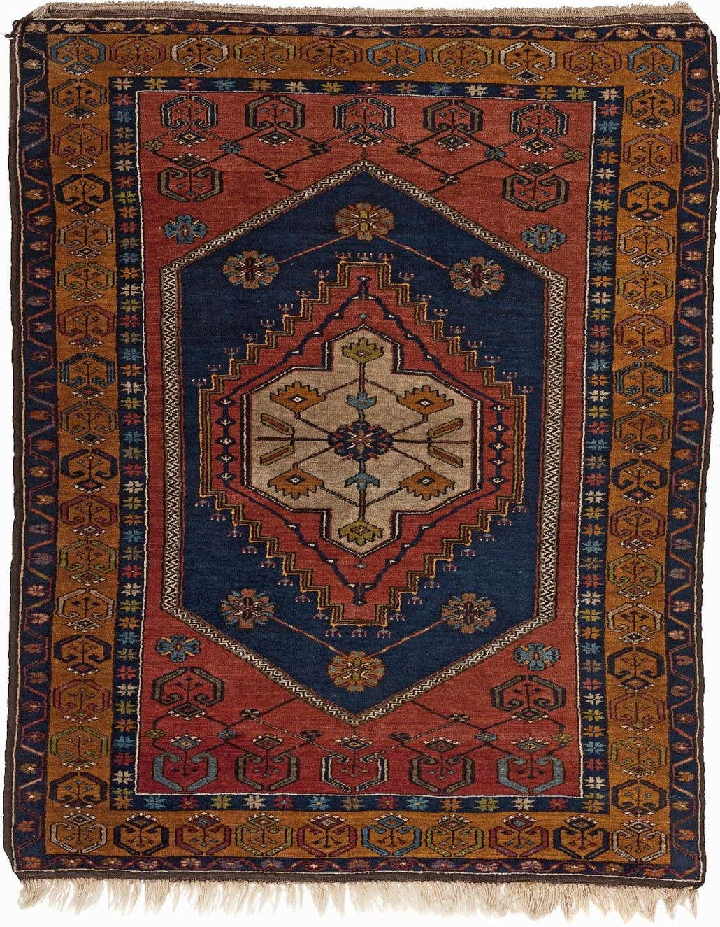 A 4x6 rectangular Yahyali rug featuring a central navy blue medallion on a red field, surrounded by intricate traditional patterns in gold, blue, and brown, with fringed ends.