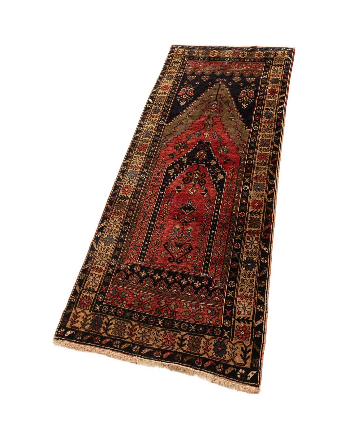 A 5x8 rectangular Yahyali rug, handmade with red, black, and gold traditional patterns, suitable for an entryway or living room.