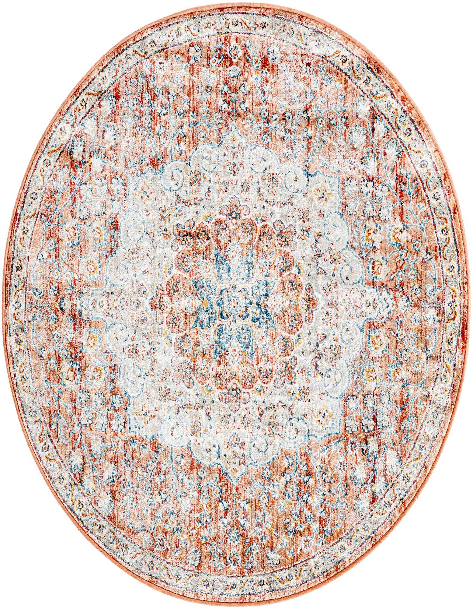 A 4' round traditional medallion rug in distressed reds, blues, and creams, featuring an ornate central design.