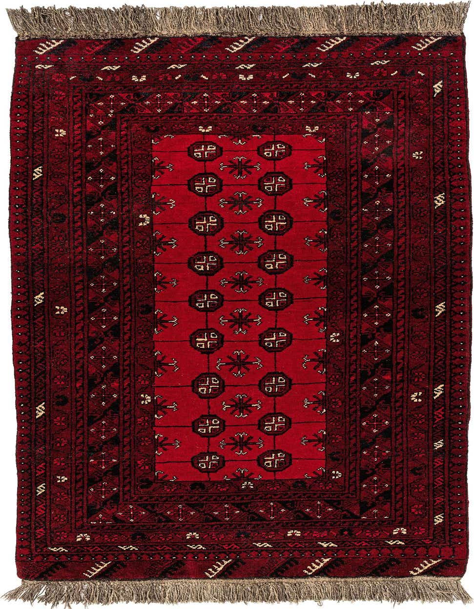 A 6 ft red tribal runner rug with black and white geometric patterns and fringed ends, ideal for a hallway.