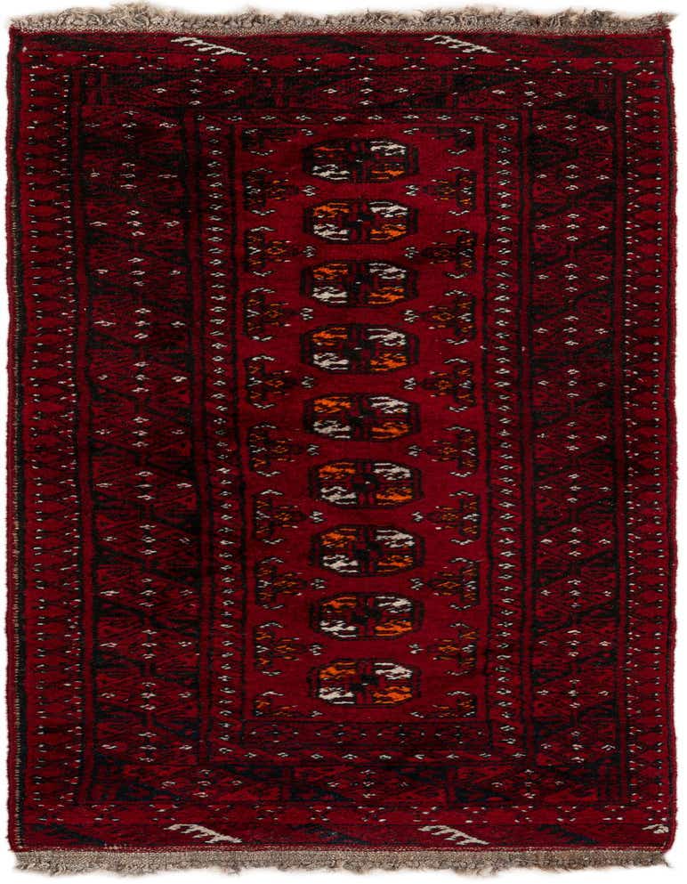 A 5 ft red wool runner rug with a tribal oriental pattern and fringes, perfect for a hallway.