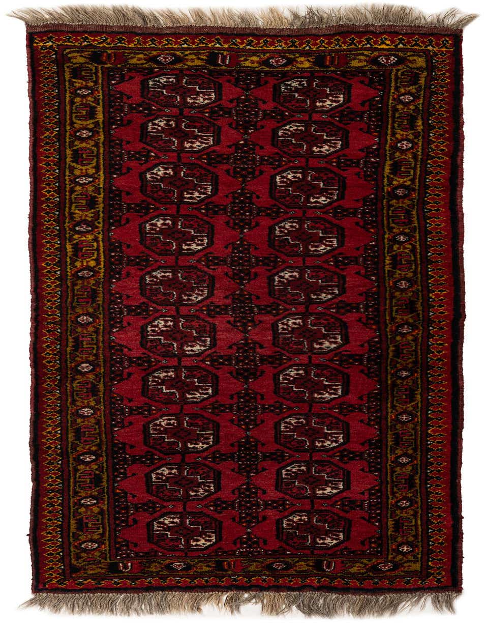 A 6 ft red runner rug with traditional tribal patterns and a gold border, ideal for a hallway or kitchen.