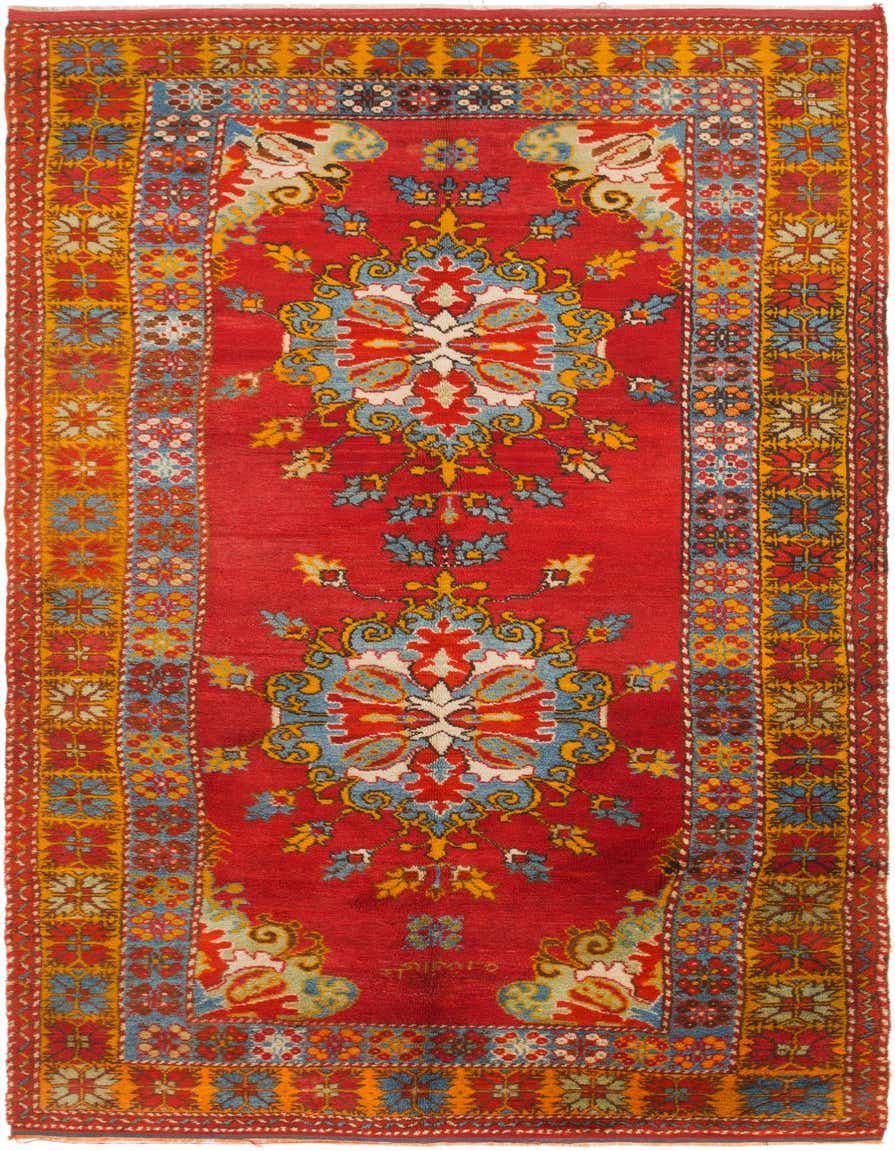 A 13 ft red runner rug with a central medallion design and intricate Southwestern and Oriental patterns in blue, yellow, and white.
