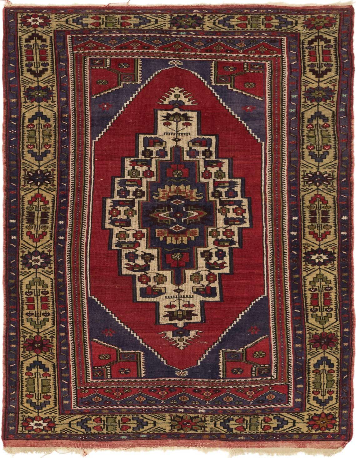 An 8 ft Anatolian runner rug with a traditional tribal medallion pattern in reds, navy, and gold, ideal for a hallway or kitchen.
