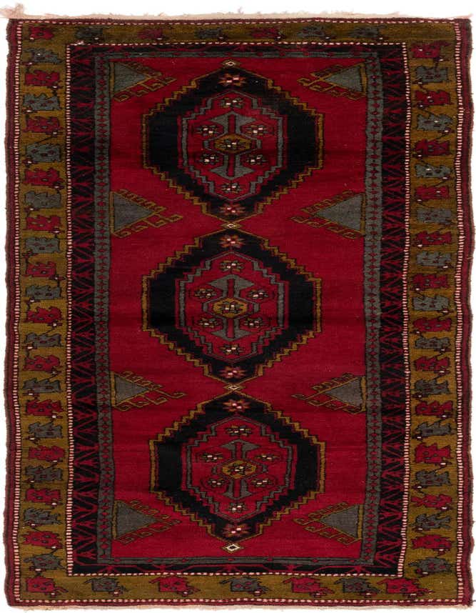 A 12 ft red runner rug with a black and gray central medallion and olive green border, featuring traditional tribal patterns.