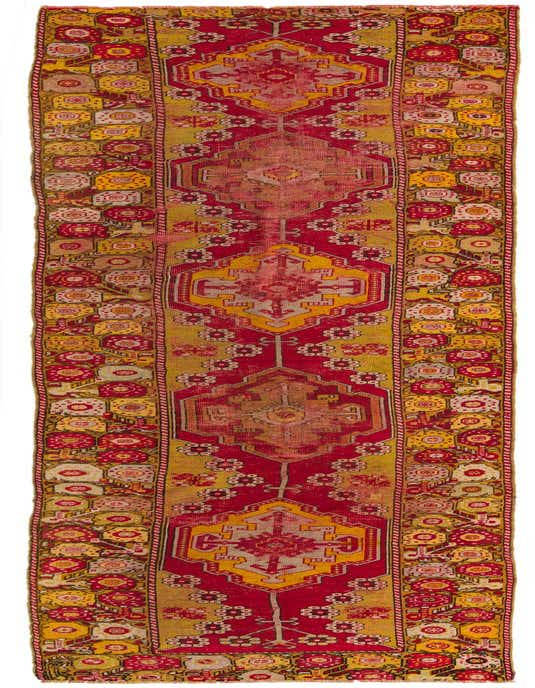 A 14 ft Anatolian runner rug in traditional Oriental style, featuring a vibrant red and gold geometric pattern with intricate floral borders, ideal for a hallway.