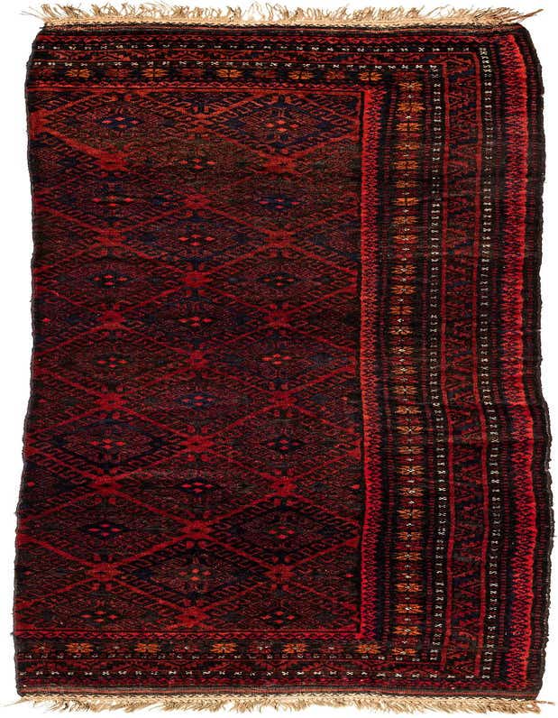 A 9 ft Balouch runner rug in deep reds and black, featuring a tribal geometric pattern with fringe.