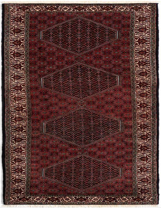 A 10 ft red Persian runner rug with intricate floral and geometric patterns, ideal for a hallway.