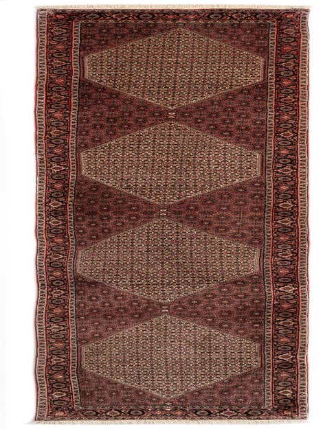 A 13 ft Bidjar Persian runner rug in shades of red, featuring intricate geometric patterns and a detailed border.
