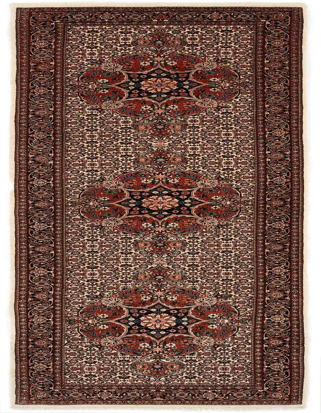 A 10 ft runner rug with a traditional Persian pattern in reds, creams, and navy, ideal for a hallway.