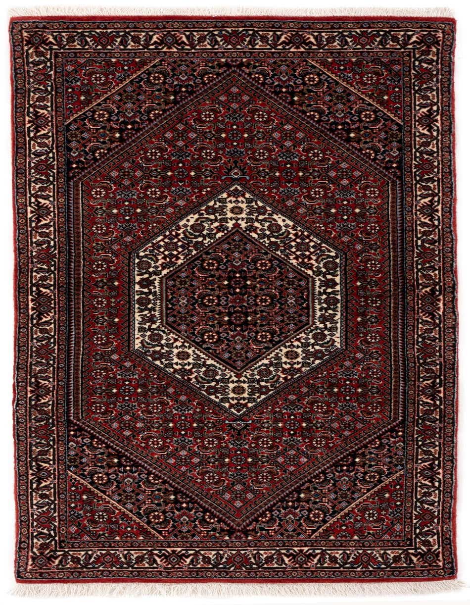 A 5 ft red runner rug with a detailed traditional pattern, featuring a central medallion and intricate floral motifs, ideal for a hallway.