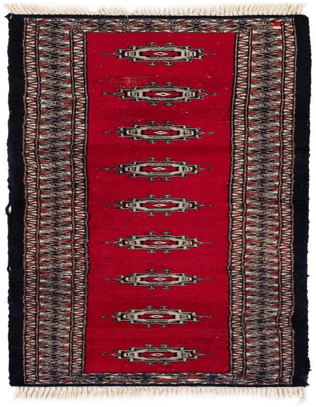 A 6 ft traditional Bokhara runner rug with a vibrant red field, black border, and tribal medallions.