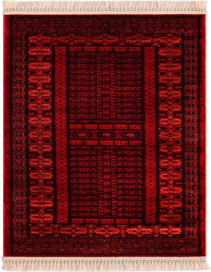 A 5 ft runner rug in shades of red with intricate black and orange traditional patterns and white fringe.