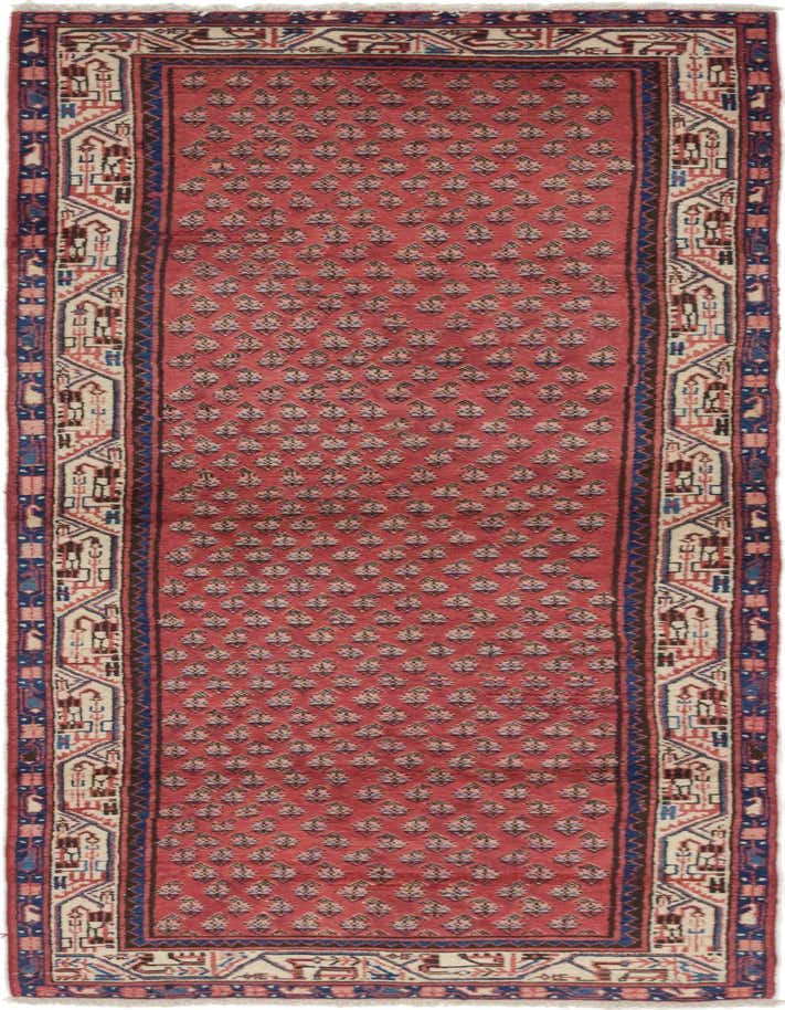 A handmade 11 ft red Persian runner rug with a repeating floral pattern and intricate tribal borders, ideal for a hallway.