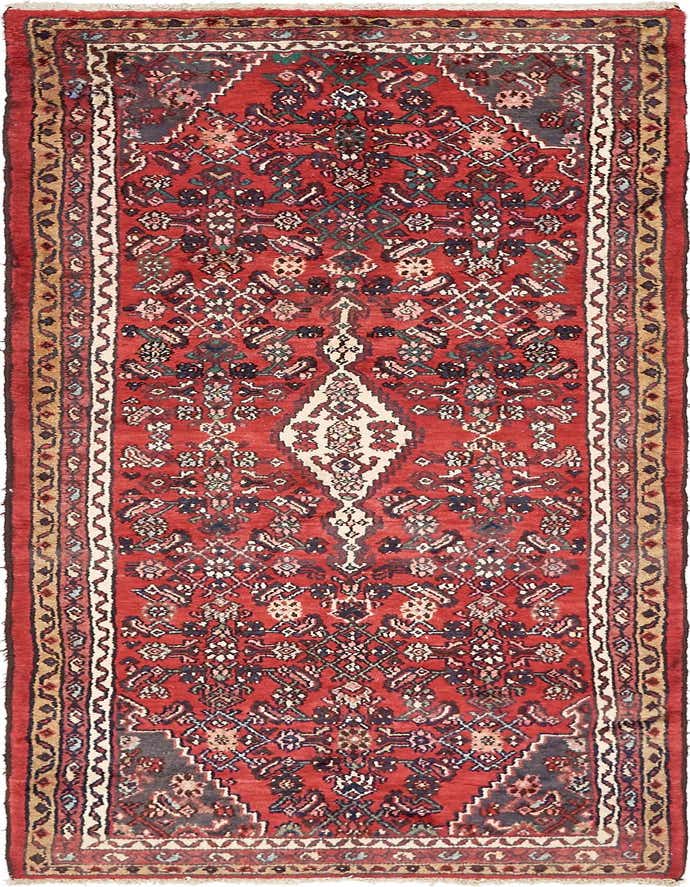 A 10 ft red tribal runner rug with a central medallion and intricate Persian patterns, ideal for a hallway.