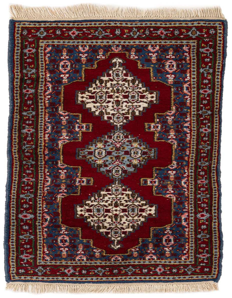 A 4 ft runner rug in traditional tribal style, featuring a deep red field with intricate blue, white, and gold patterns, ideal for hallways.