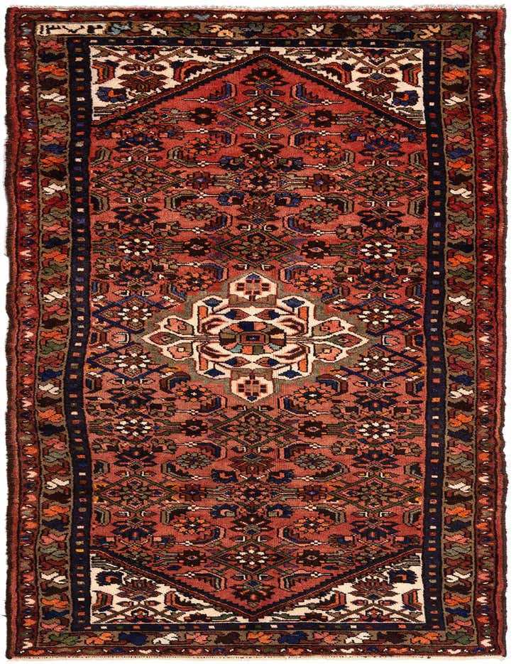 A 9 ft Hamedan runner rug in rich reds with intricate Persian tribal patterns, ideal for a hallway.