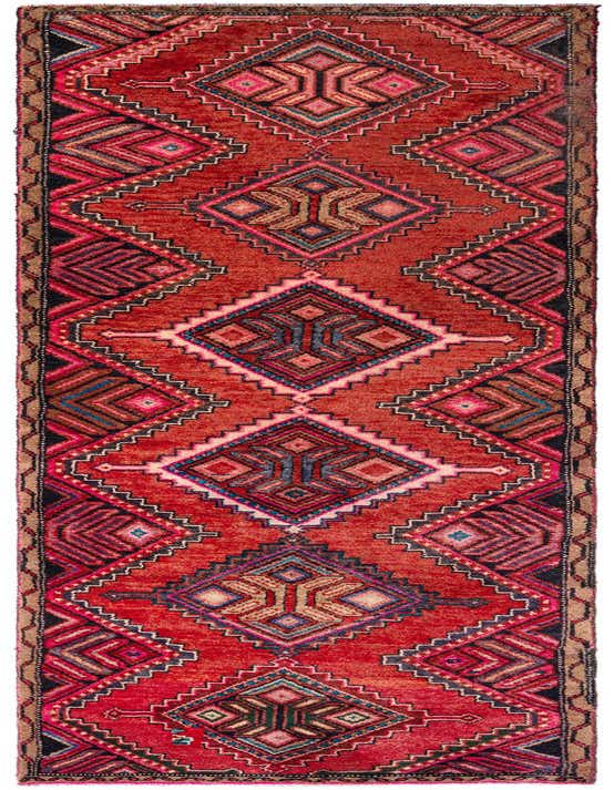 A 10 ft red wool Persian runner rug with tribal geometric patterns in shades of blue, pink, and beige.