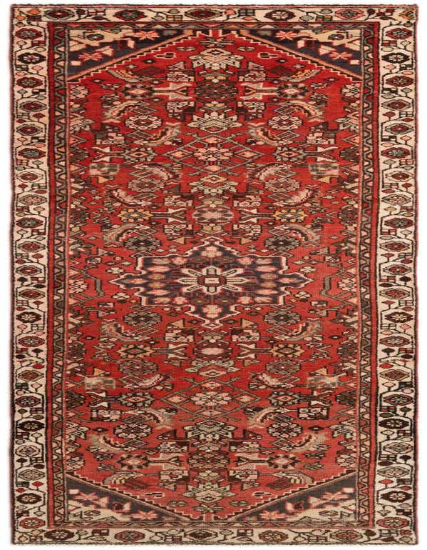A long 8 ft runner rug featuring a traditional tribal pattern in various shades of red, black, and cream.