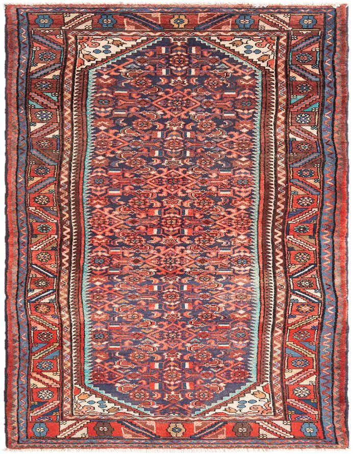 A 10 ft Hamedan runner rug featuring a traditional tribal pattern in deep reds, navy blue, and cream, ideal for a hallway.