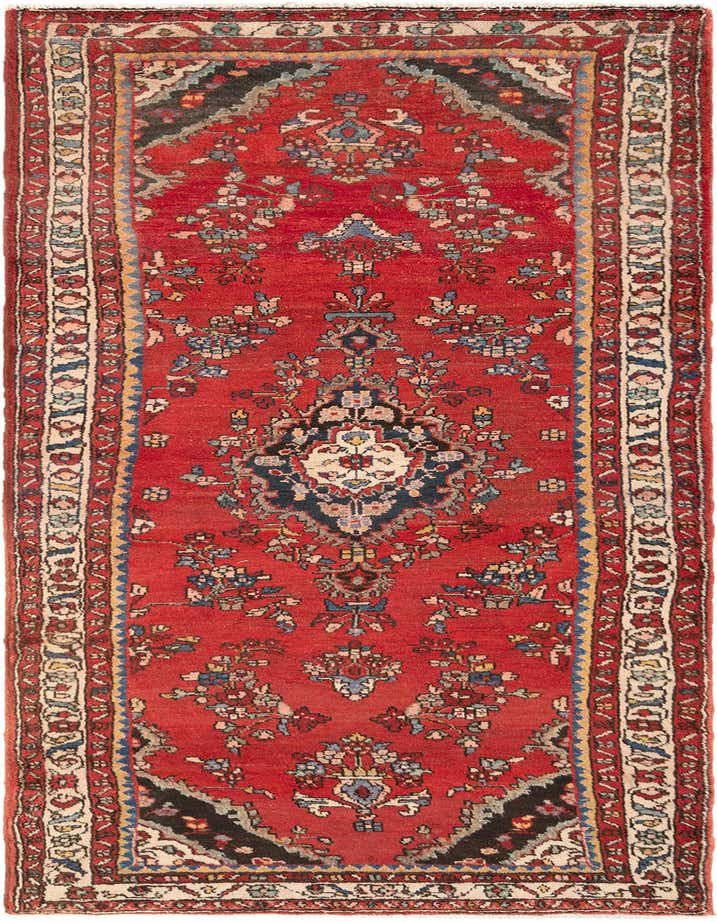 A 10 ft Hamedan wool runner rug in rich red with a traditional tribal pattern and intricate floral motifs.