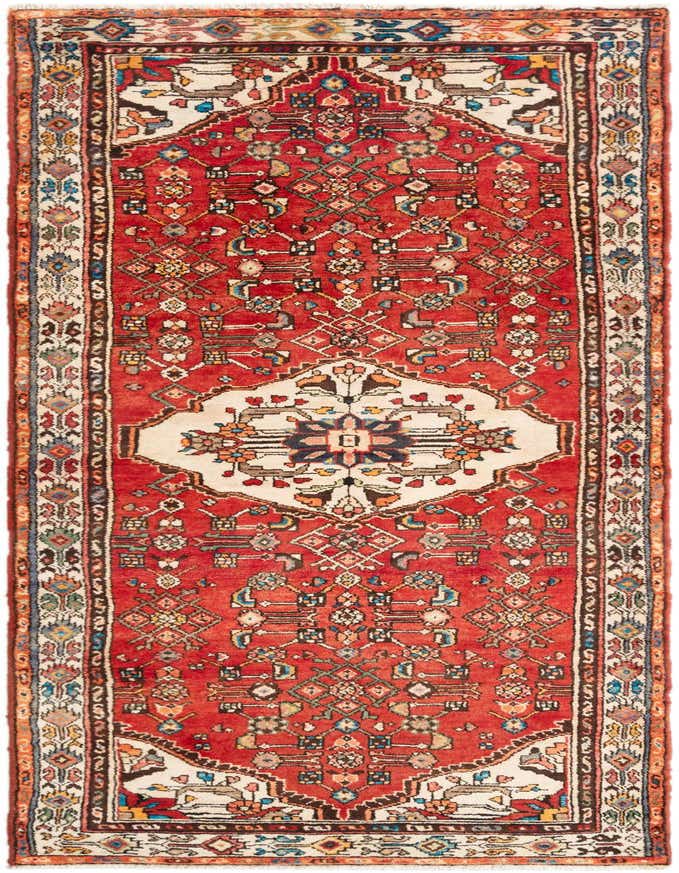 A handmade 10 ft Hamedan wool runner rug in red with a tribal, traditional pattern, ideal for hallways.