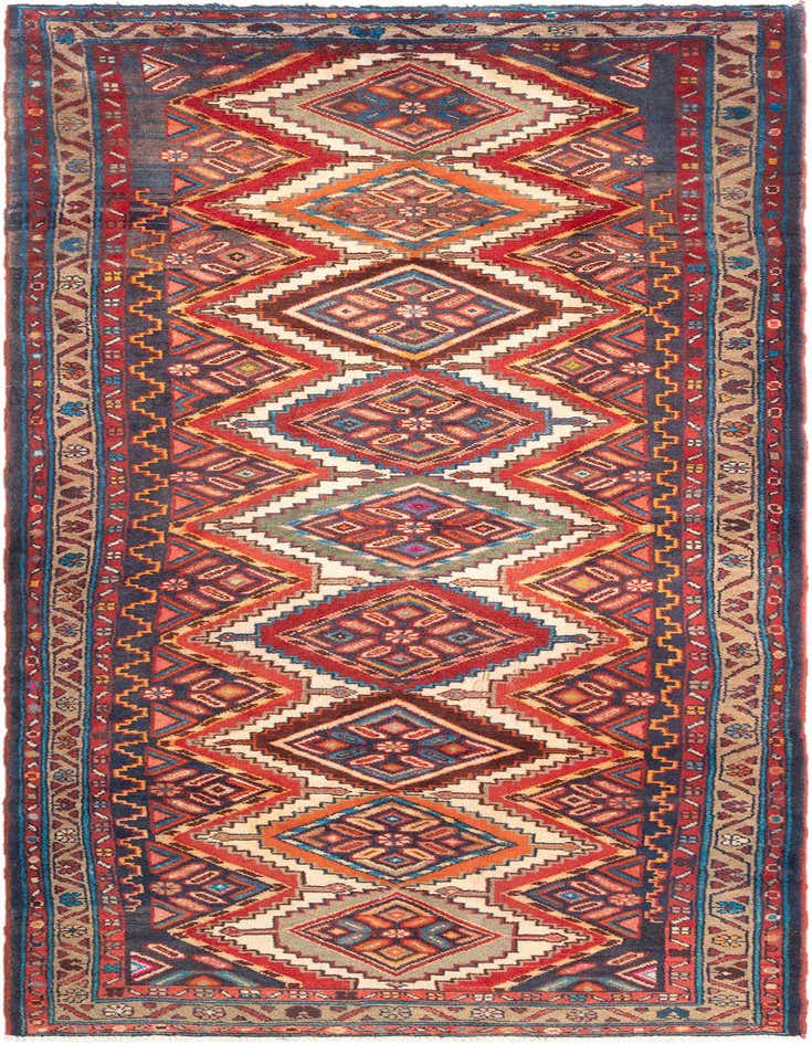 A 10 ft Hamedan runner rug featuring a vibrant tribal pattern with red, blue, orange, and cream diamonds.