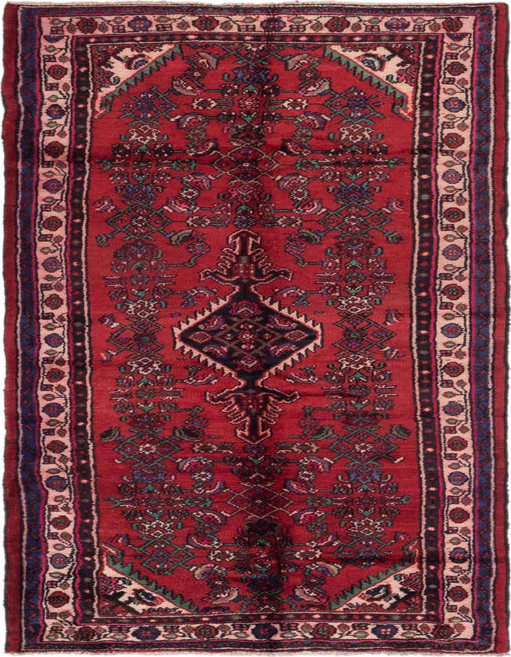 A 10 Ft Hamedan runner rug in deep red, featuring a traditional Persian medallion and botanical patterns, ideal for a hallway.