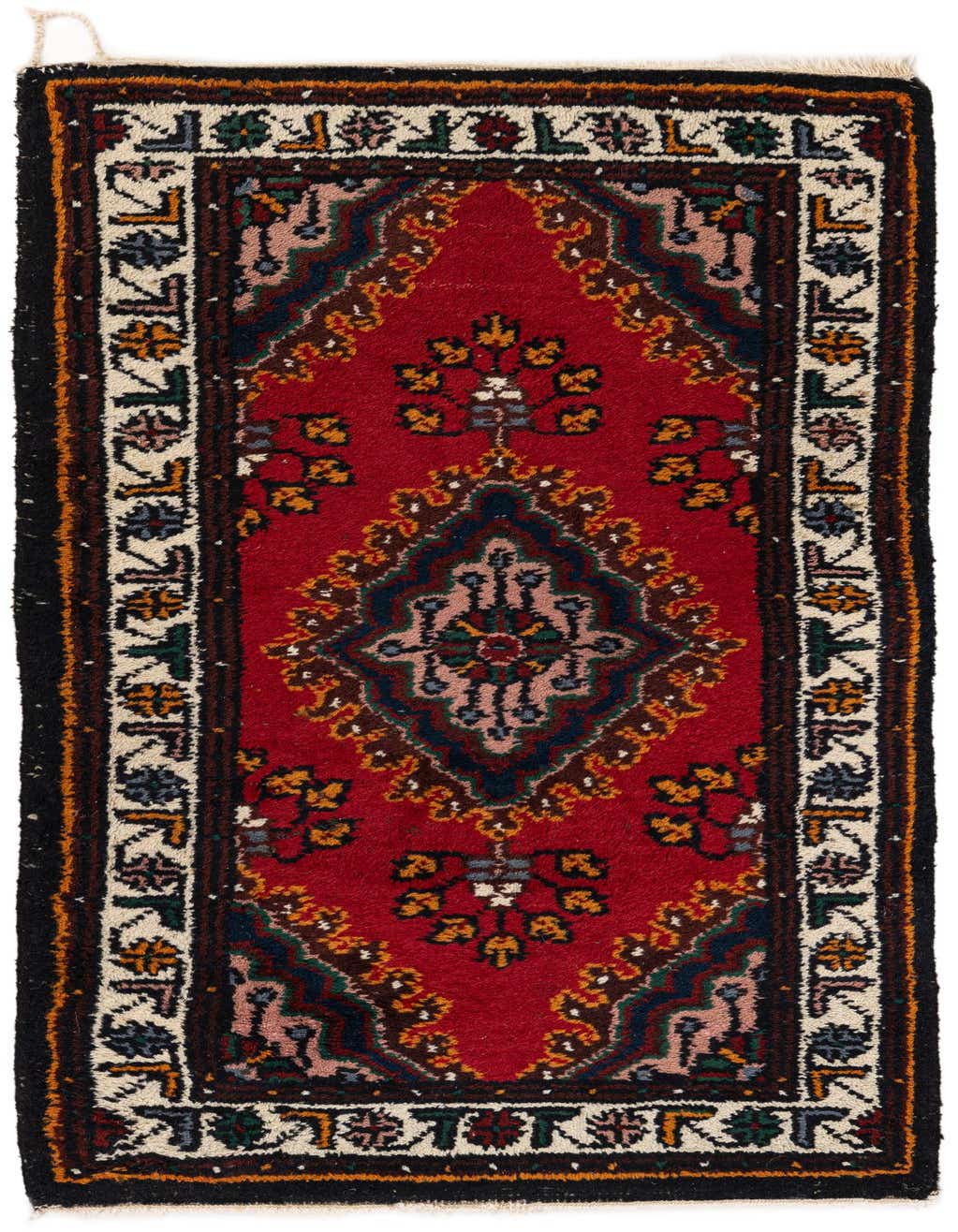 A 4 ft red wool runner rug with a traditional tribal medallion pattern and intricate border.