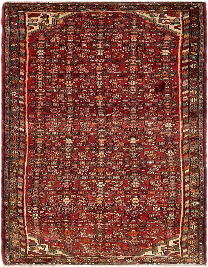 A 10 ft red traditional runner rug with intricate tribal patterns and a detailed border, perfect for a hallway.