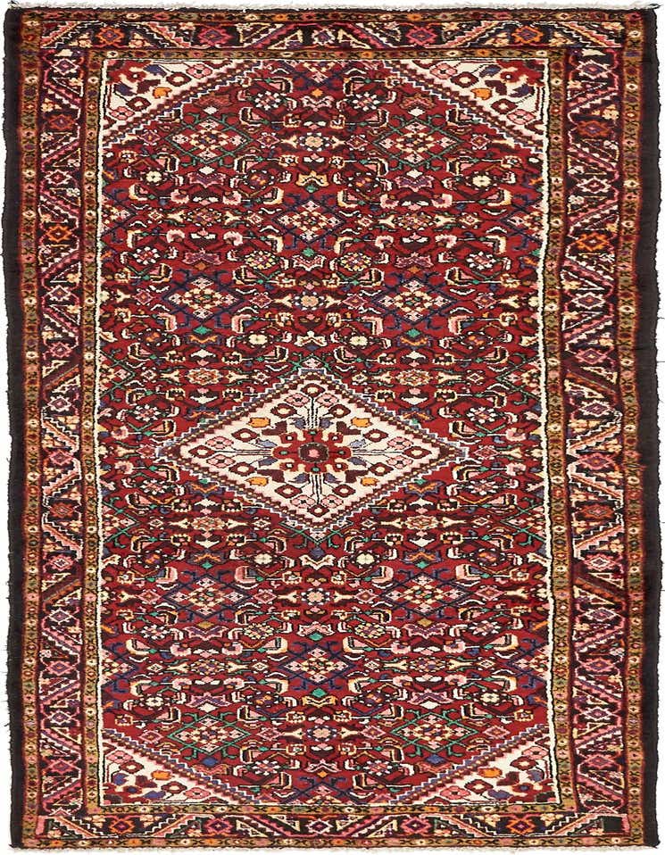 A 9 ft runner rug in traditional Persian style, featuring a central diamond medallion and botanical patterns in reds, blues, and creams, ideal for a hallway.