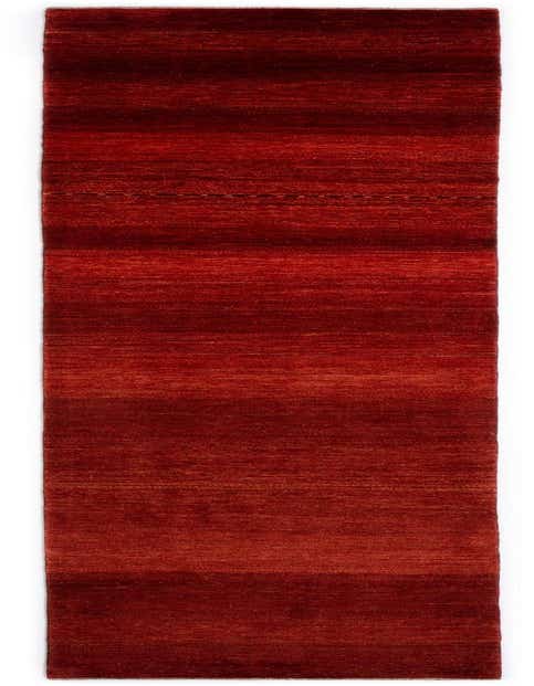 A 14 ft Kashkuli runner rug in varying shades of deep red, showcasing its handmade wool texture.