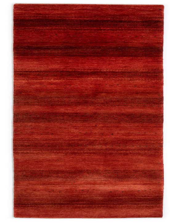 A 12 ft handmade red wool runner rug with subtle horizontal stripes in varying shades of red, ideal for a hallway.