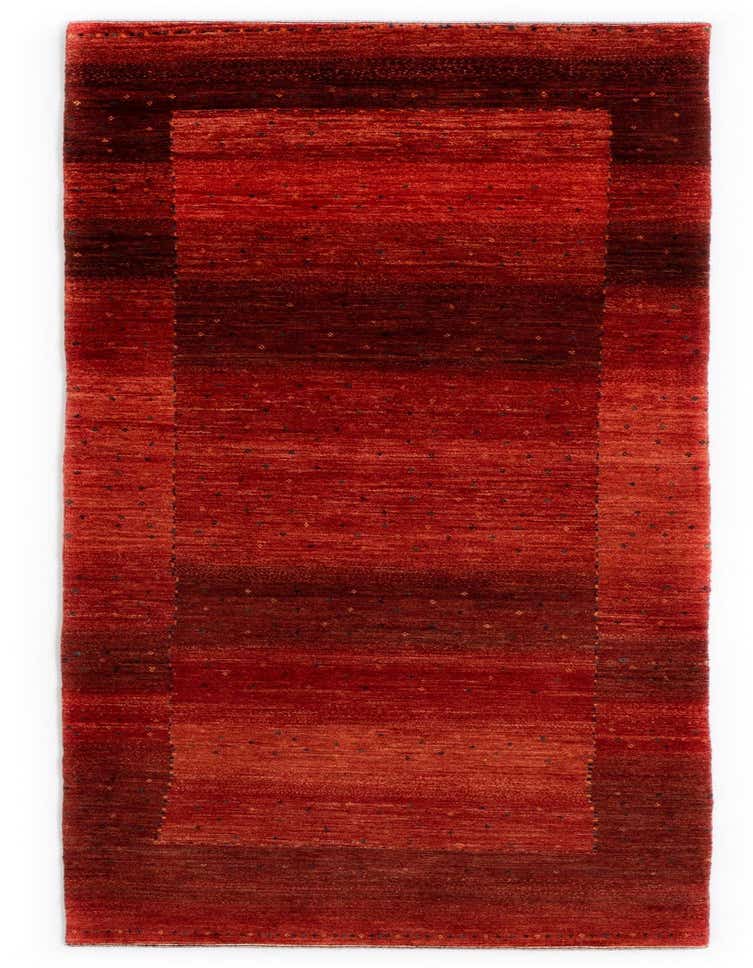 A 9 ft runner rug in varying shades of red, featuring a Persian style with a subtle dotted pattern and a darker red border.