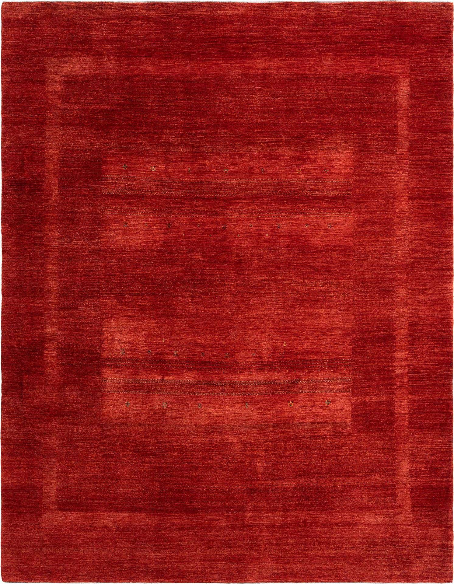 A handmade 12 ft red wool runner rug with subtle Persian patterns, ideal for a hallway.