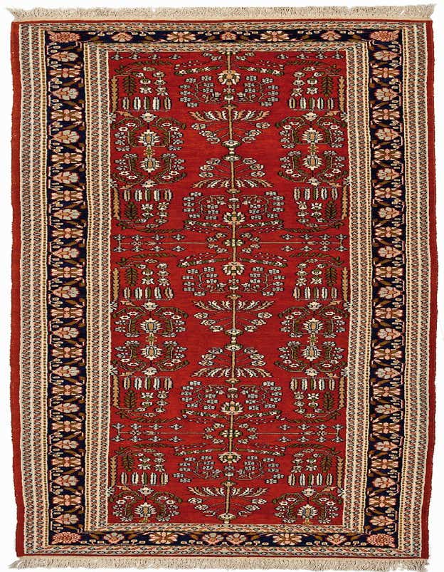 A 10 ft red wool runner rug with a traditional Oriental floral pattern and navy blue border, ideal for a hallway.