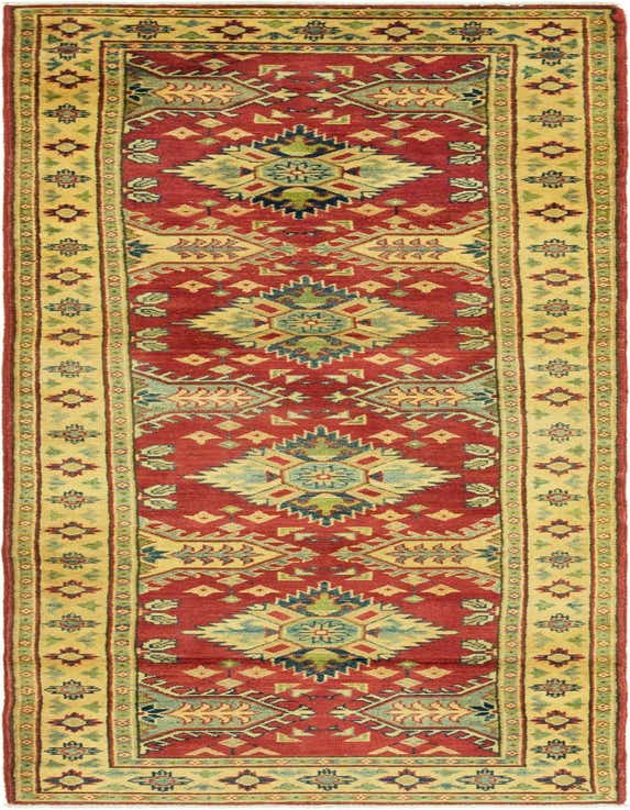 A 10 ft runner rug in traditional Southwestern style, featuring a red field with geometric patterns in gold, blue, and green, perfect for a hallway.