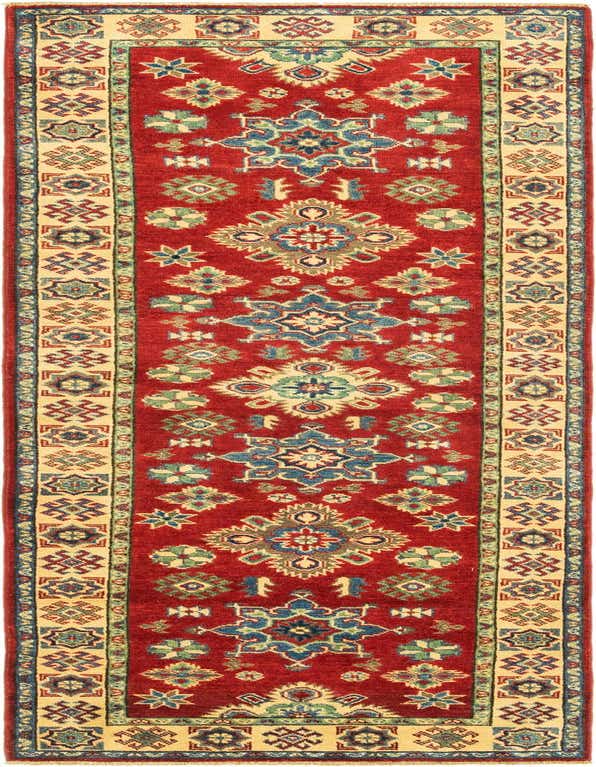 A 10 ft red runner rug with a traditional tribal medallion pattern in blue, green, and cream, ideal for a hallway.