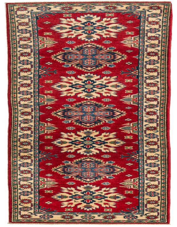 A 10 ft red runner rug with a traditional Southwestern pattern, featuring cream, blue, and green geometric motifs, ideal for a hallway.