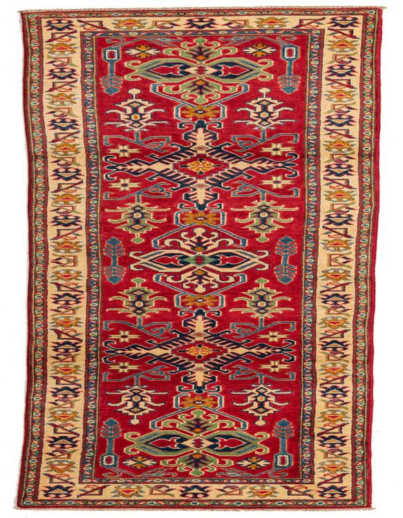 A 10 ft runner rug with a vibrant red field and intricate traditional Southwestern patterns in blue, green, and gold, framed by a cream border, ideal for a hallway.